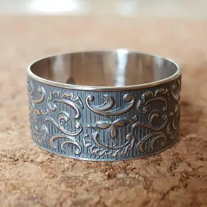 Wide silver wedding ring, flower and leaf pattern, women's wedding band, textured silver base, raised yellow gold edges, art nouveau design
